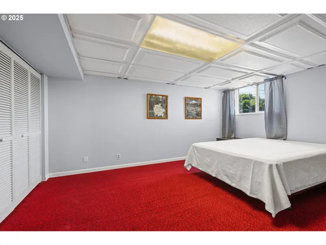 a room with furniture and a window