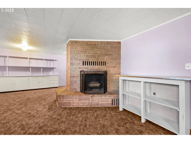 a room with cabinets and window