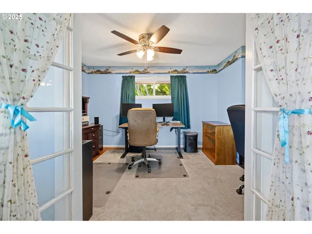 a dining room with furniture and wooden floor