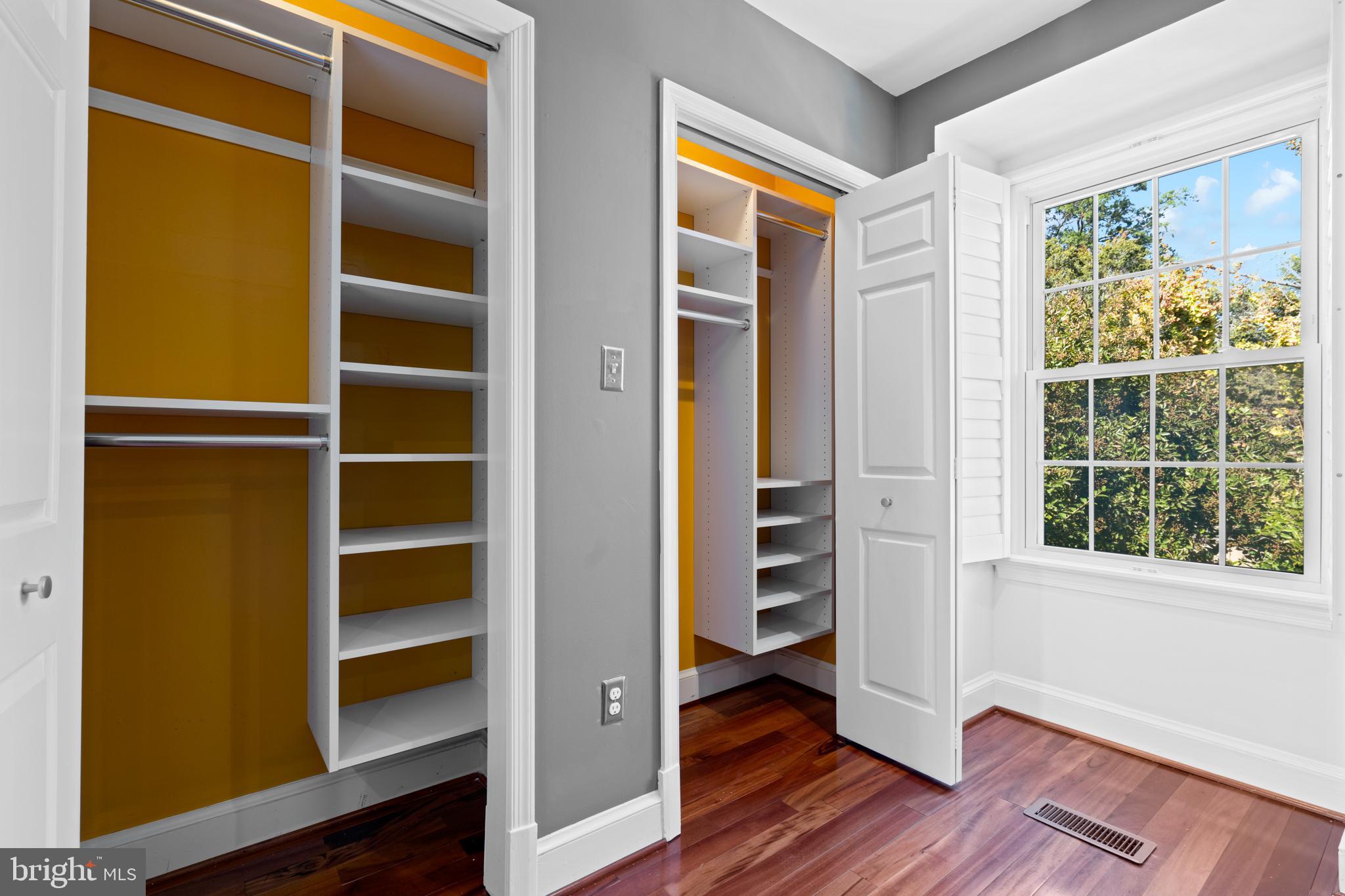 1616 Belmont Street Northwest, Unit A Washington, DC 20009 - Photo 19 of 25 a view of closet area with wooden floor