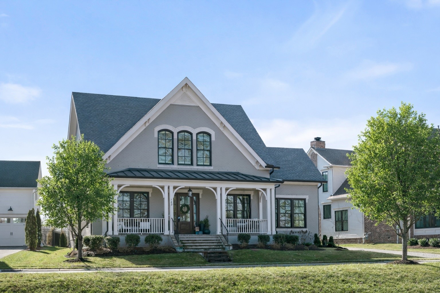 143 Splendor Ridge Drive Franklin, TN 37064 - Photo 1 of 75 a front view of a house with a yard