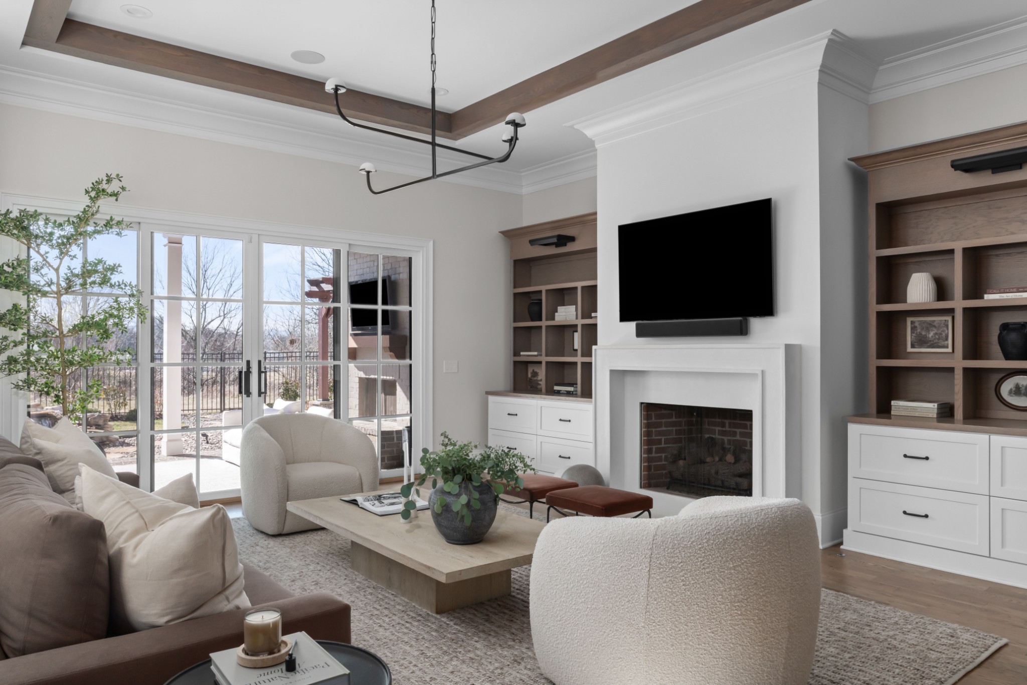143 Splendor Ridge Drive Franklin, TN 37064 - Photo 21 of 75 a living room with furniture a fireplace and a flat screen tv