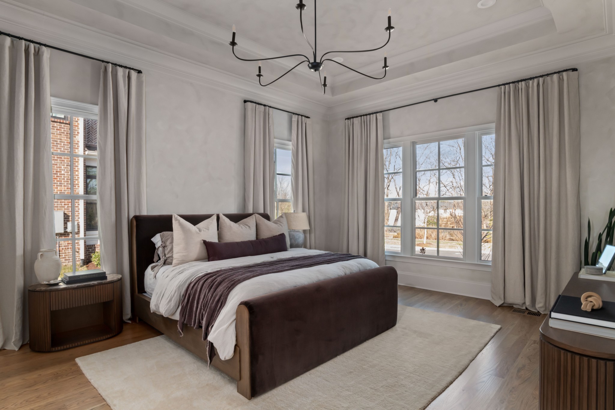 143 Splendor Ridge Drive Franklin, TN 37064 - Photo 28 of 75 a spacious bedroom with a bed a dresser and a chandelier