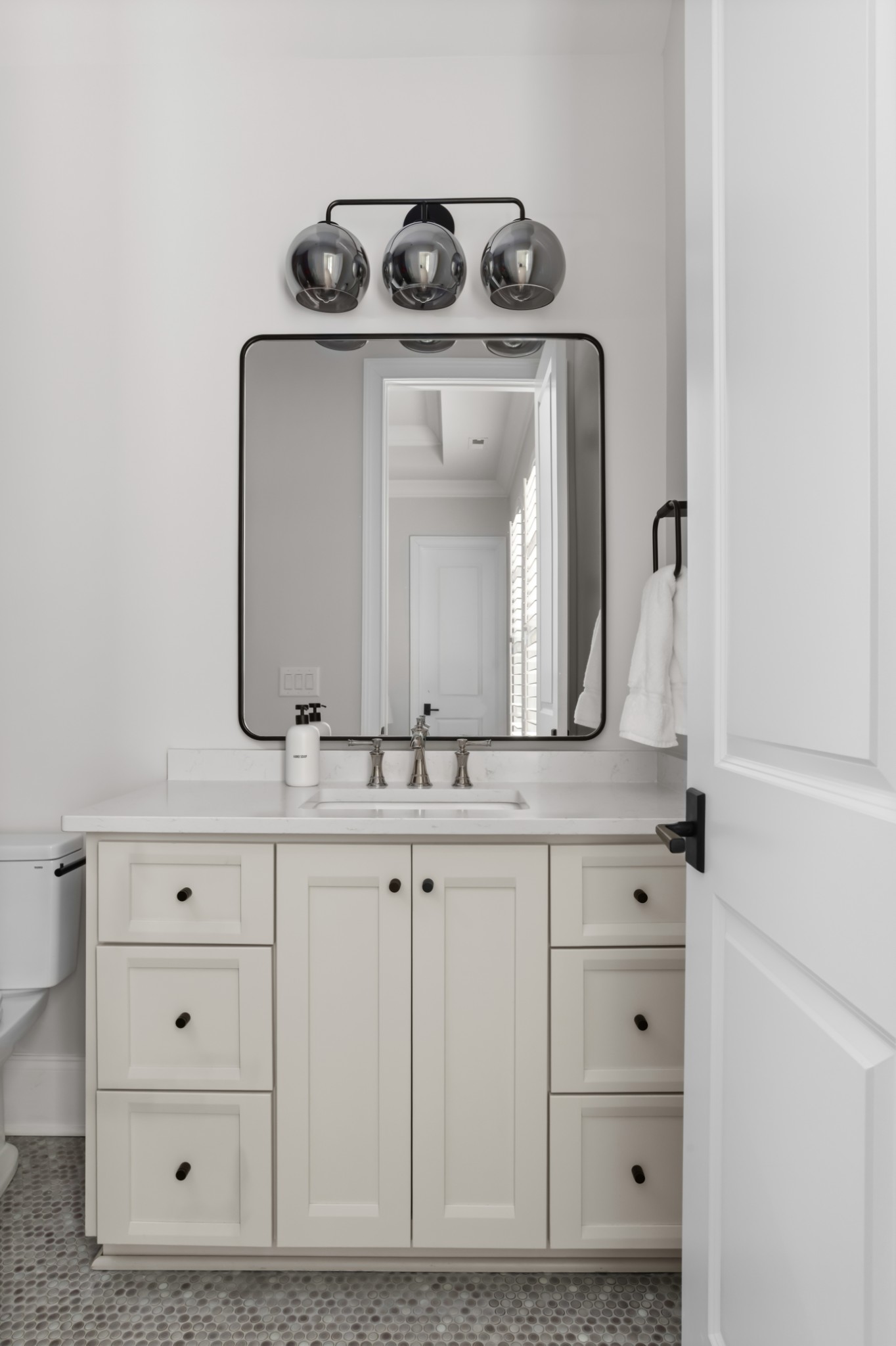 143 Splendor Ridge Drive Franklin, TN 37064 - Photo 48 of 75 a bathroom with a sink vanity and mirror