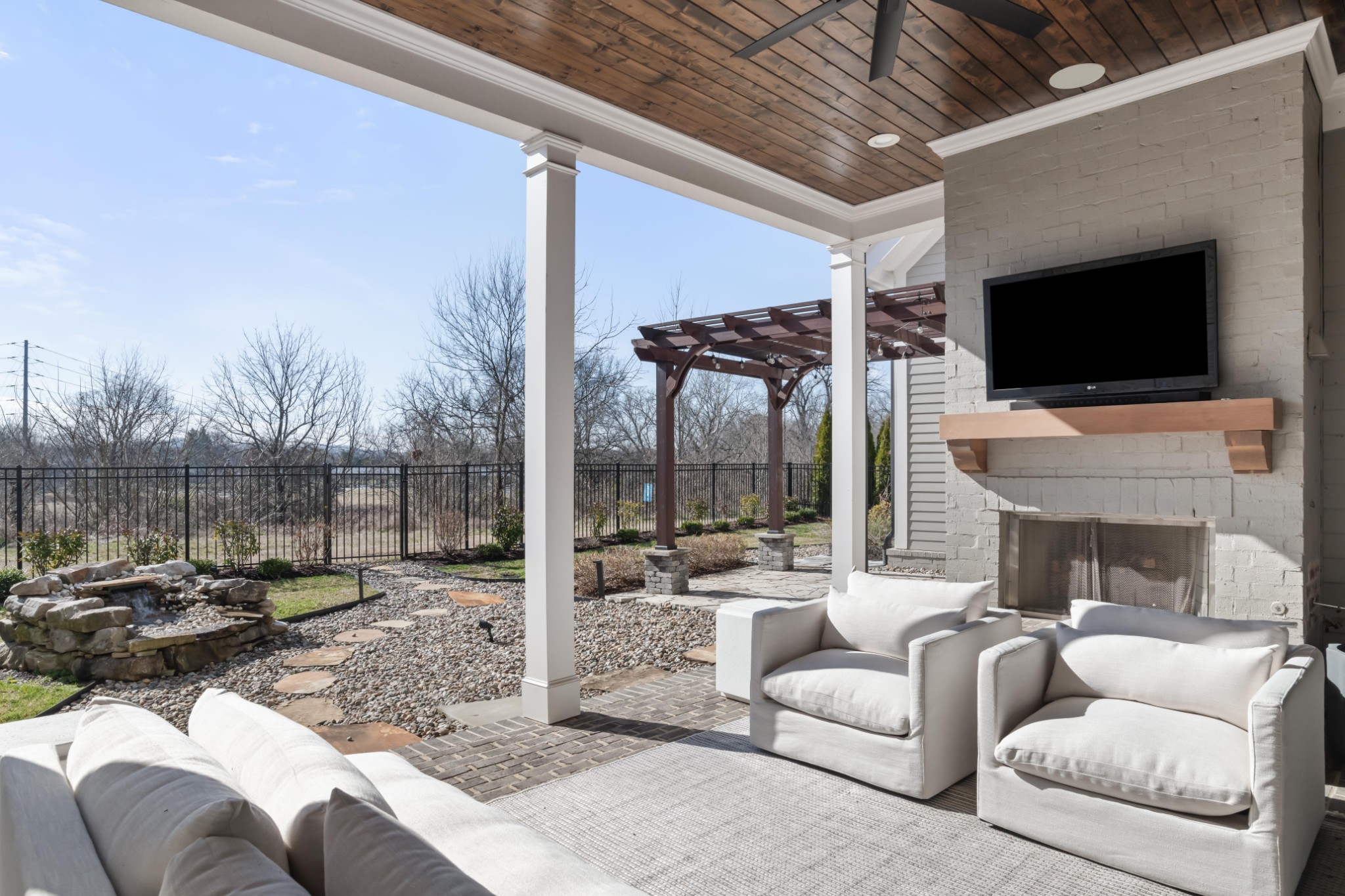 143 Splendor Ridge Drive Franklin, TN 37064 - Photo 66 of 75 a outdoor space with patio the couches and a fireplace
