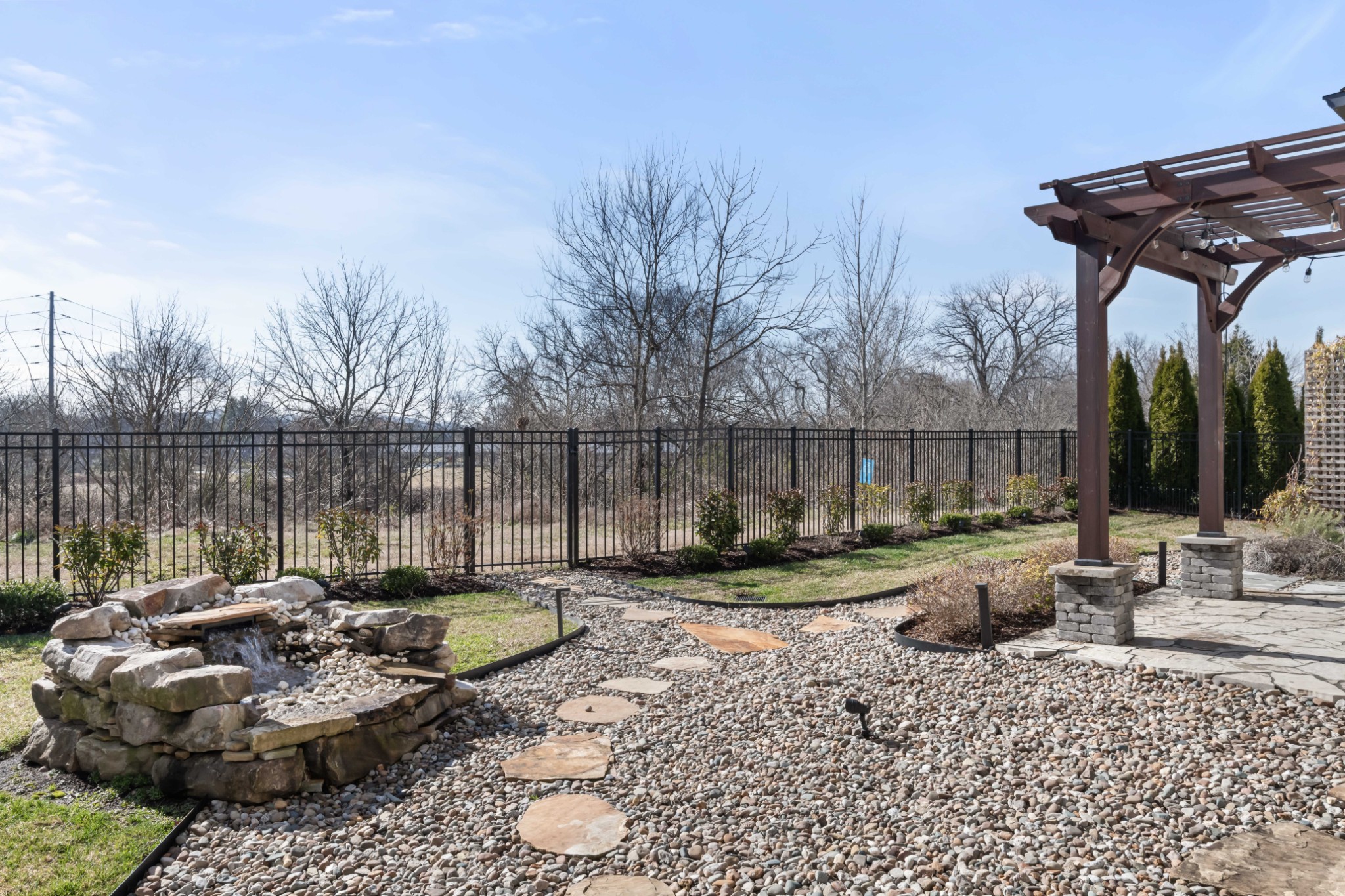 143 Splendor Ridge Drive Franklin, TN 37064 - Photo 74 of 75 a backyard of a house with barbeque oven table and chairs