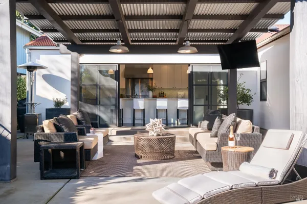 a dining area with furniture and outdoor view