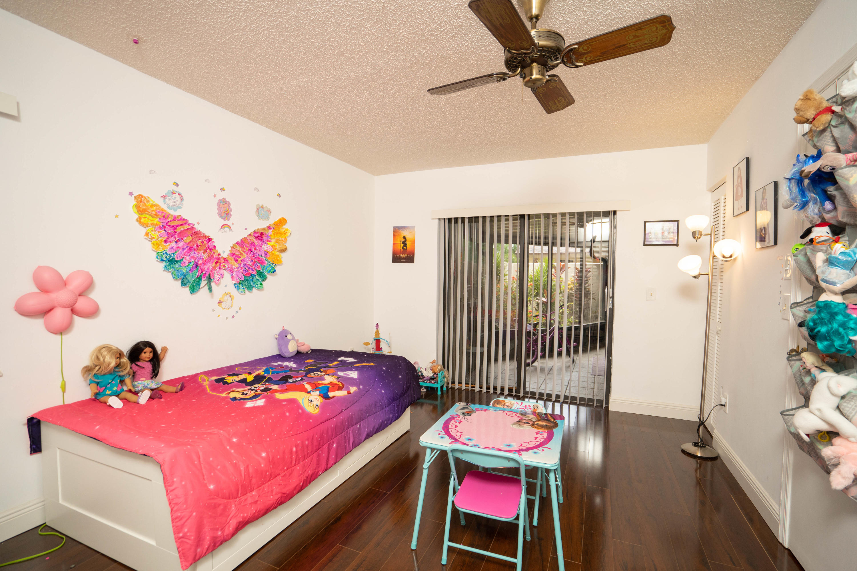 8930 Southwest 19th Street, Unit G Boca Raton, FL 33433 - Photo 11 of 18 a bedroom with a bed and a table