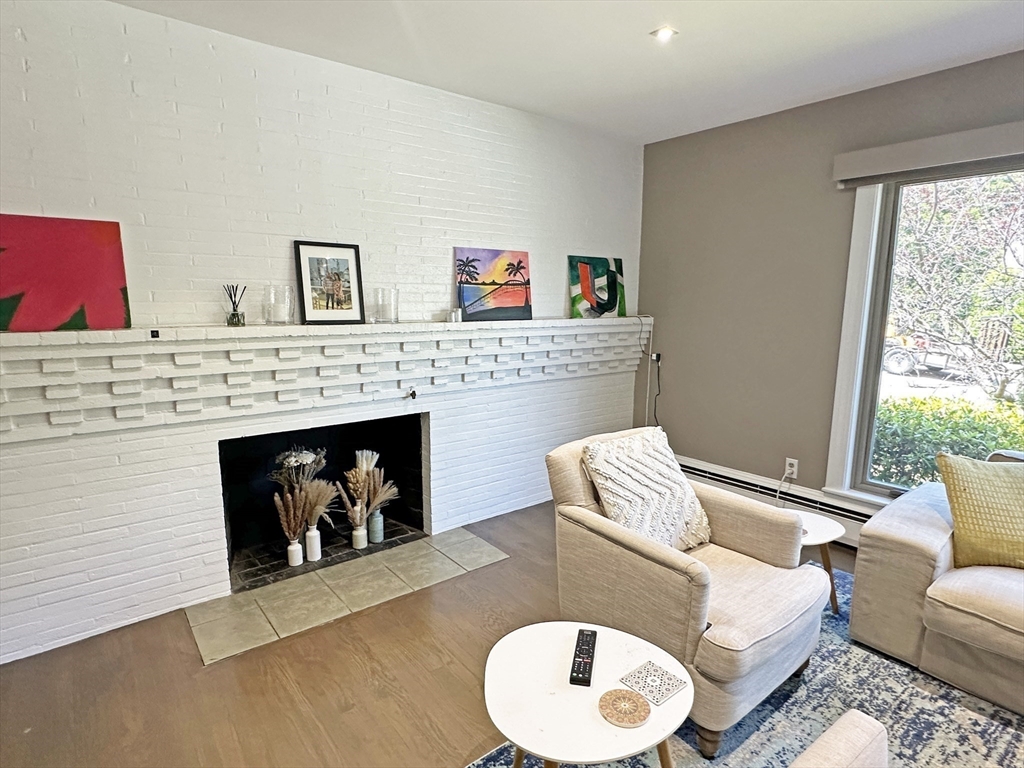 6 Brownson Terrace Boston, MA 02130 - Photo 8 of 38 a living room with furniture and a fireplace