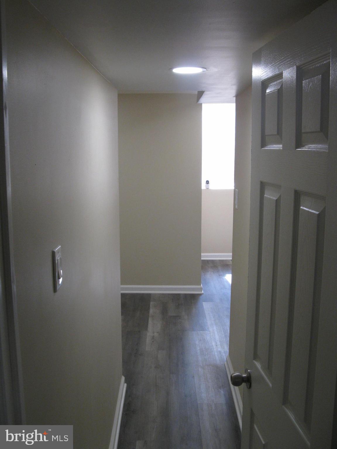 708 North Glover Street Baltimore, MD 21205 - Photo 33 of 38 a view of hallway with wooden floor
