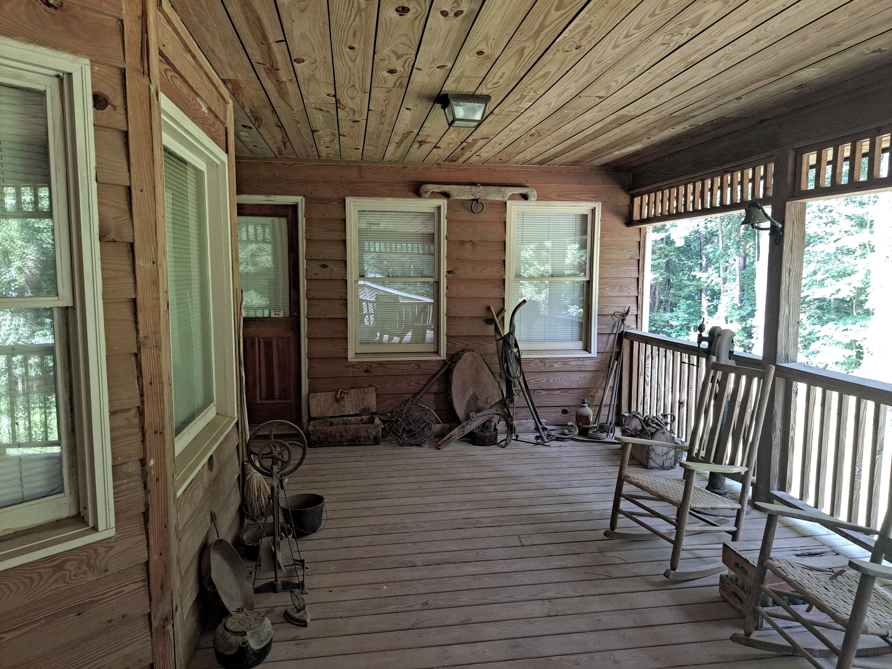 7505 Hall Road Fairburn, GA 30213 - Photo 13 of 25 a view of balcony with wooden floor and furniture