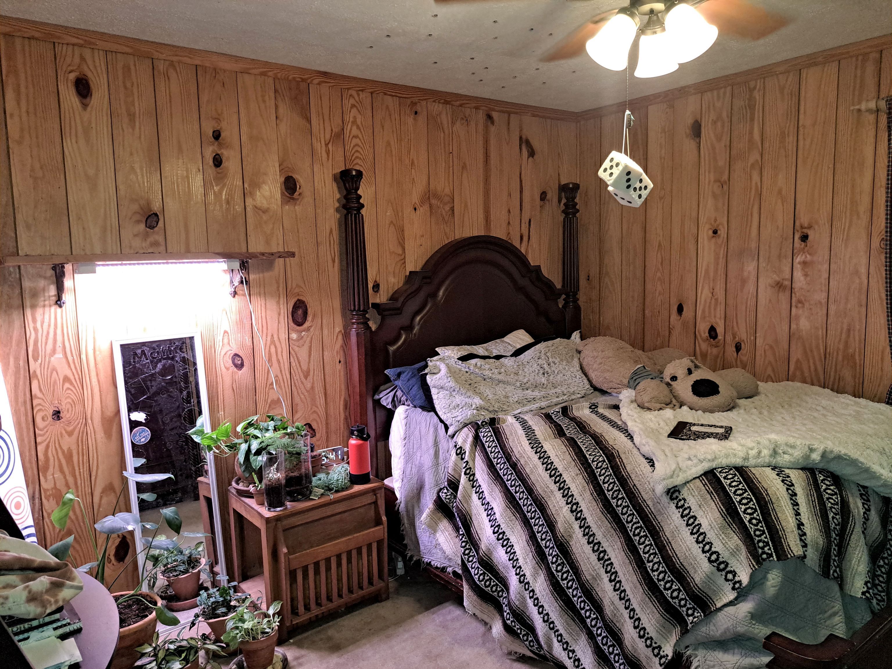 7505 Hall Road Fairburn, GA 30213 - Photo 15 of 25 a bed room with a bed and a table