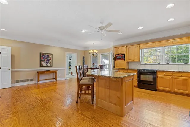 a view of a room with a wooden door
