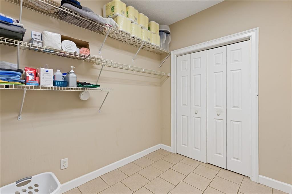 3740 Woodlane Road Gainesville, GA 30506 - Photo 38 of 70 a view of storage and utility room with racks on the wall