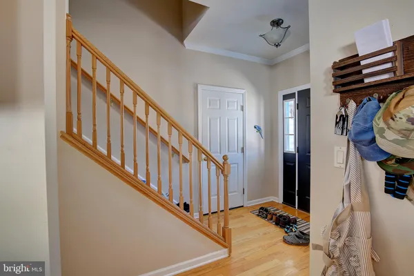 a living room with furniture fireplace and flat screen tv
