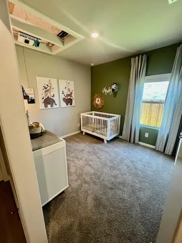 a view of livingroom with furniture and windows
