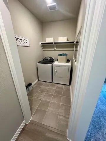 a room with washer and dryer
