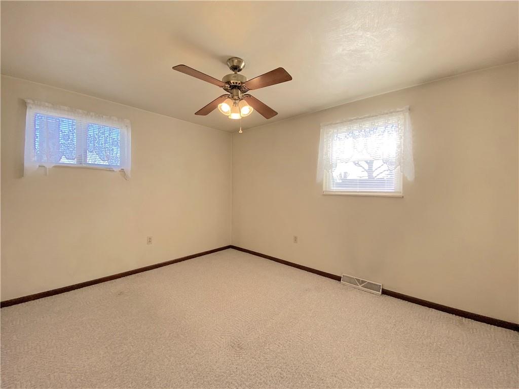 1821 Cowling Road Scottdale, PA 15683 - Photo 14 of 24 a view of an empty room with a window