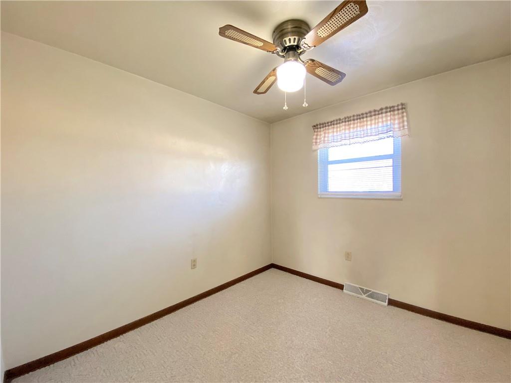1821 Cowling Road Scottdale, PA 15683 - Photo 16 of 24 an empty room with a window