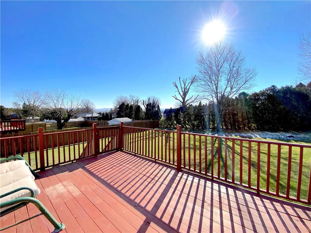 1821 Cowling Road Scottdale, PA 15683 - Photo 20 of 24 a view of balcony with wooden floor and fence