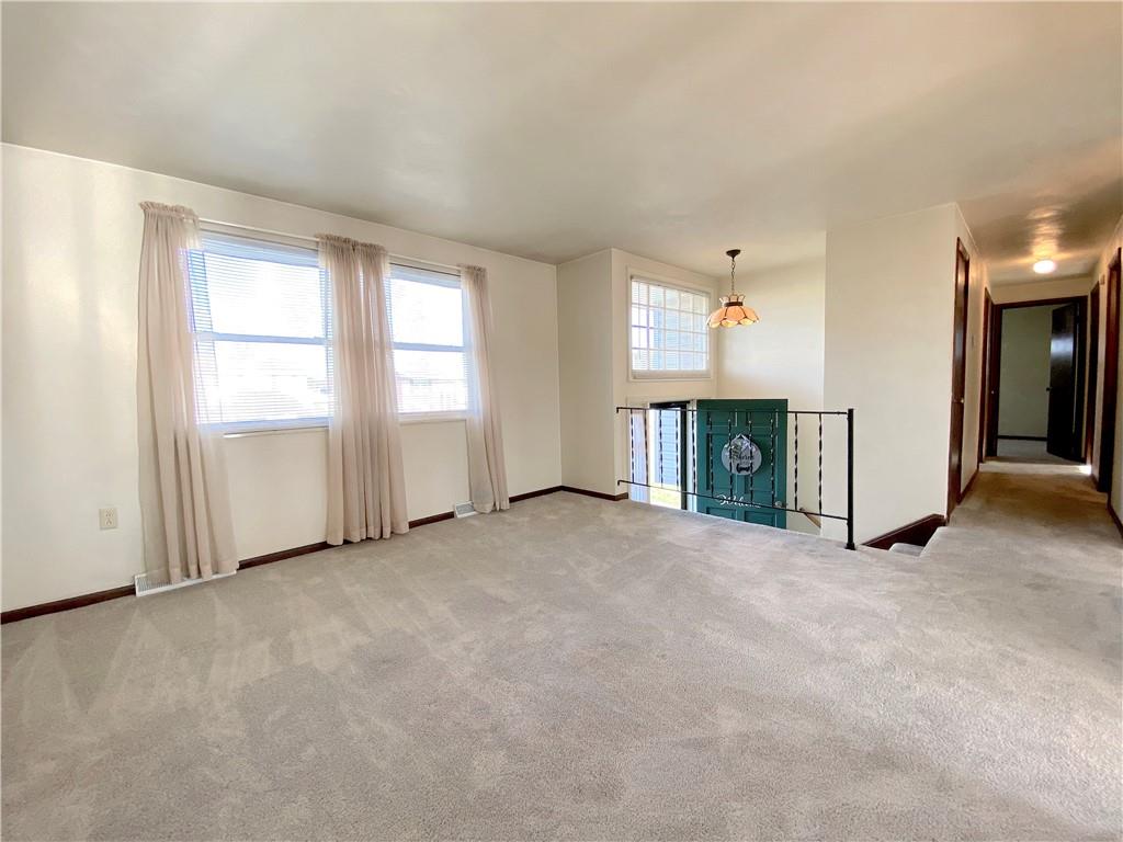 1821 Cowling Road Scottdale, PA 15683 - Photo 5 of 24 an empty room with windows and closet