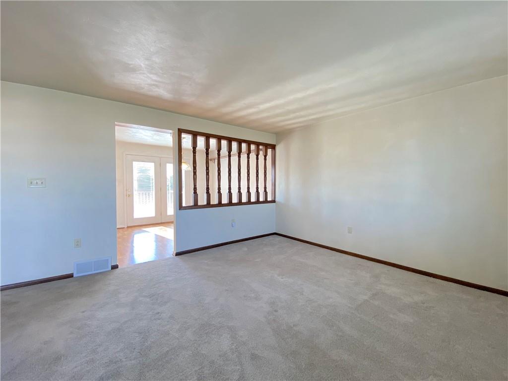 1821 Cowling Road Scottdale, PA 15683 - Photo 7 of 24 an empty room with windows