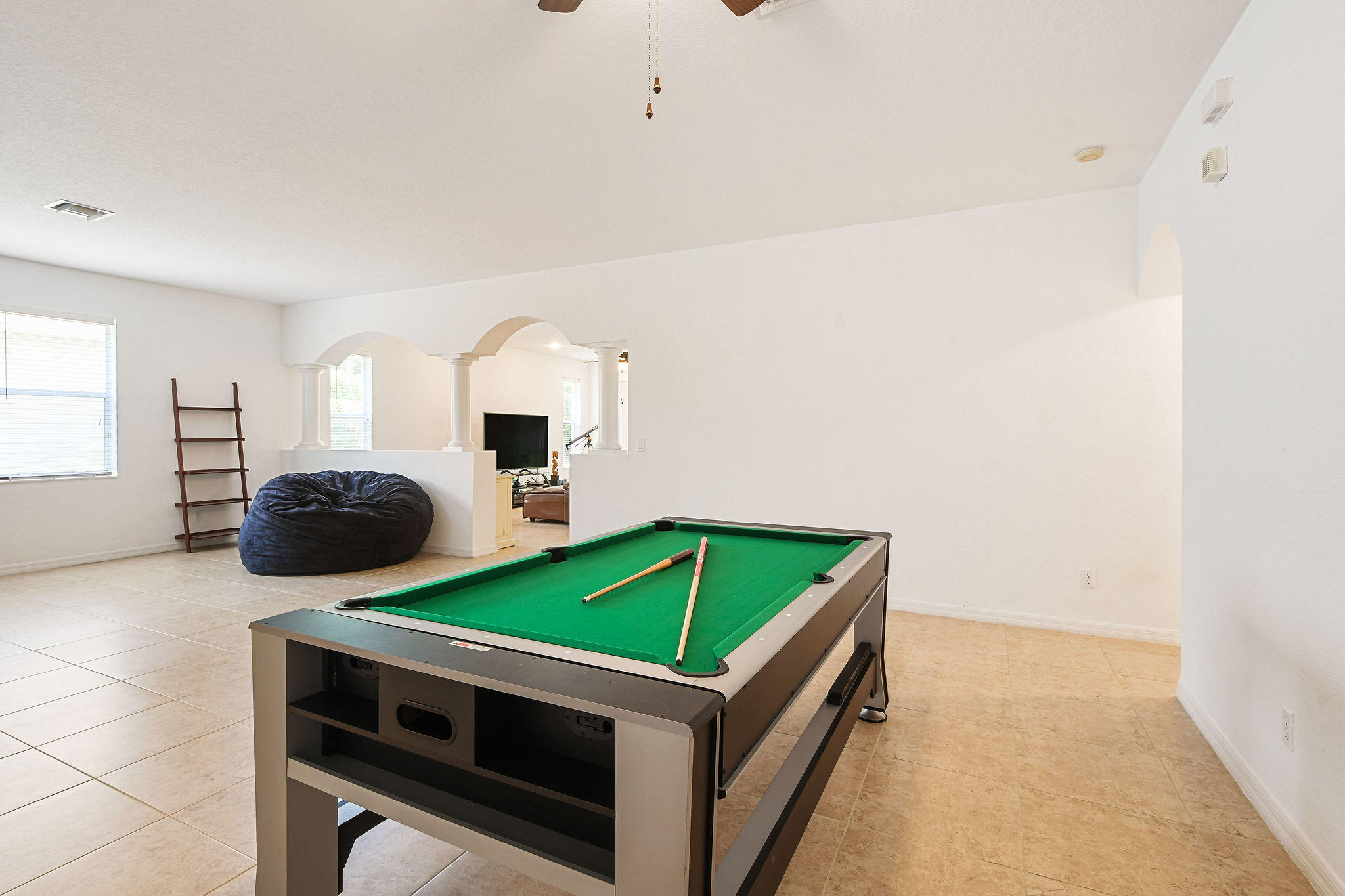 4100 Silverstone Drive Fort Pierce, FL 34947 - Photo 12 of 42 a room with table and chairs