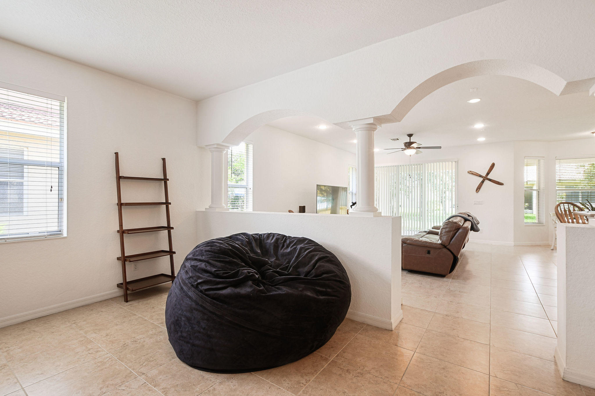 4100 Silverstone Drive Fort Pierce, FL 34947 - Photo 14 of 42 a room with a couch and furniture