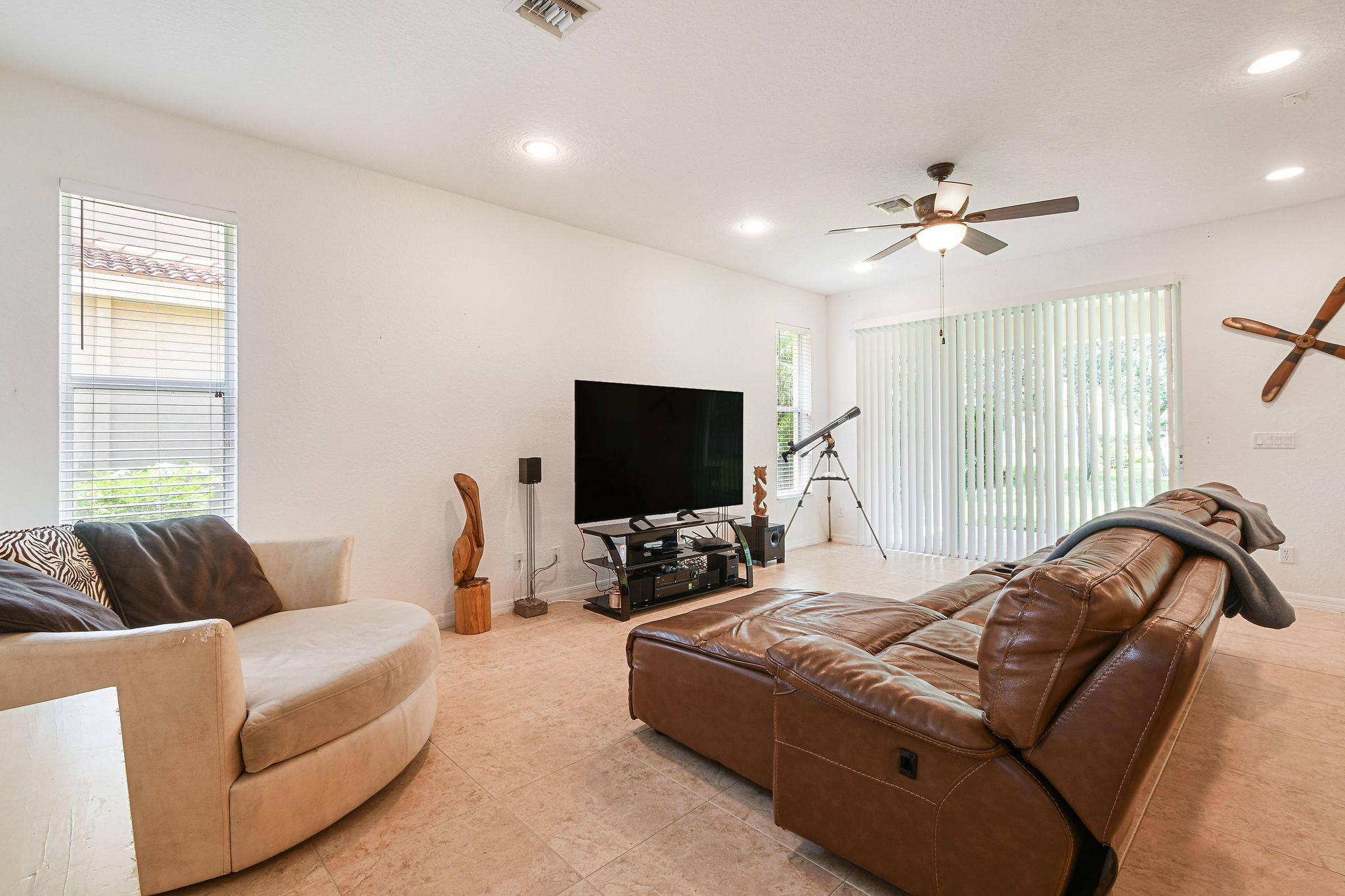 4100 Silverstone Drive Fort Pierce, FL 34947 - Photo 15 of 42 a bedroom with a bed and a flat screen tv