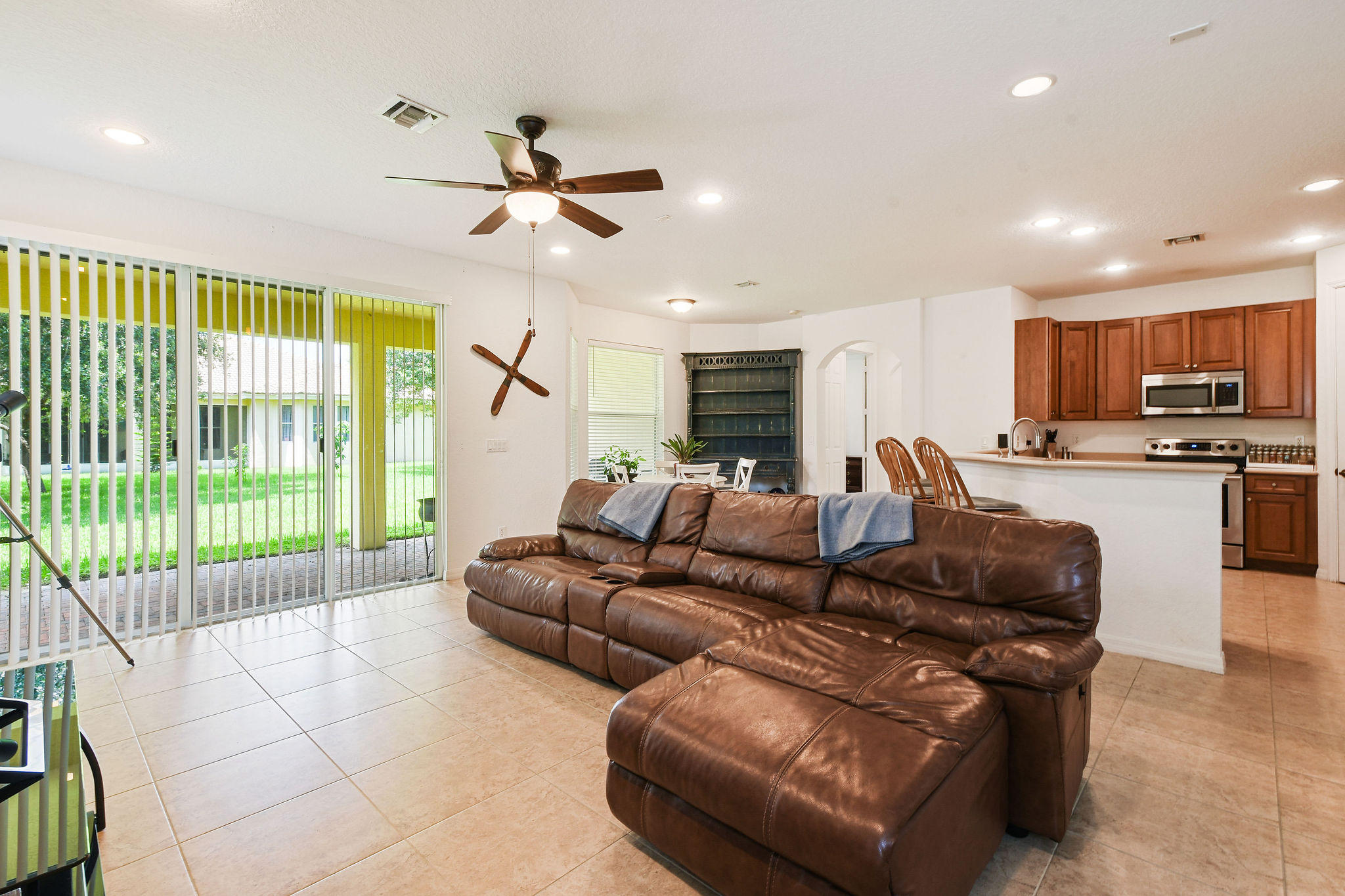 4100 Silverstone Drive Fort Pierce, FL 34947 - Photo 16 of 42 a living room with furniture and a large window