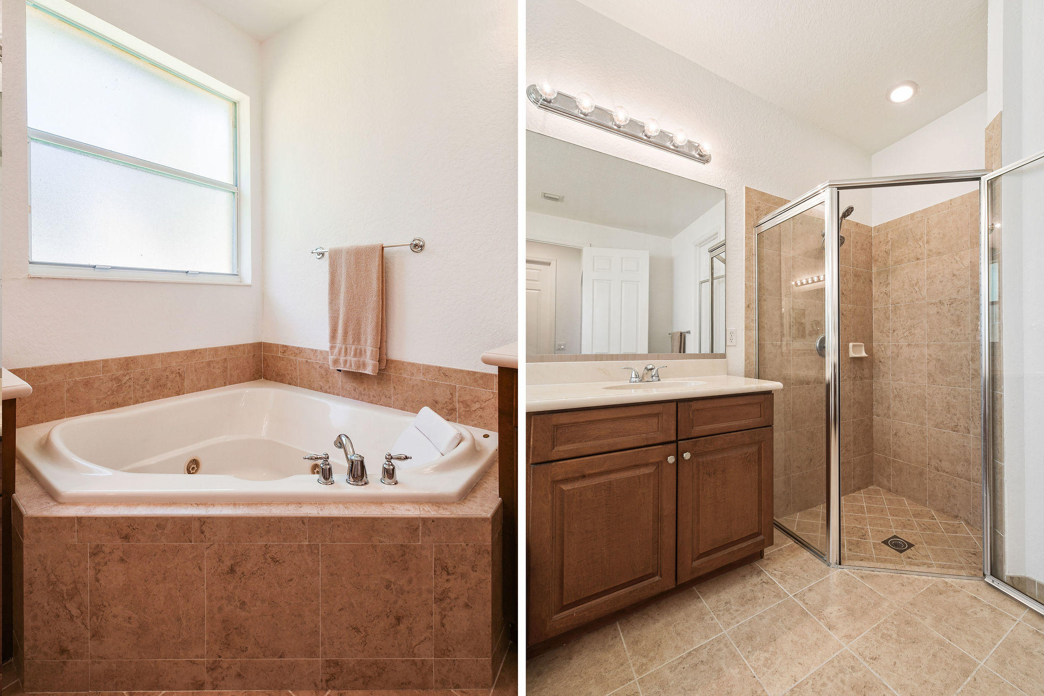 4100 Silverstone Drive Fort Pierce, FL 34947 - Photo 30 of 42 a bathroom with a tub a sink and a mirror