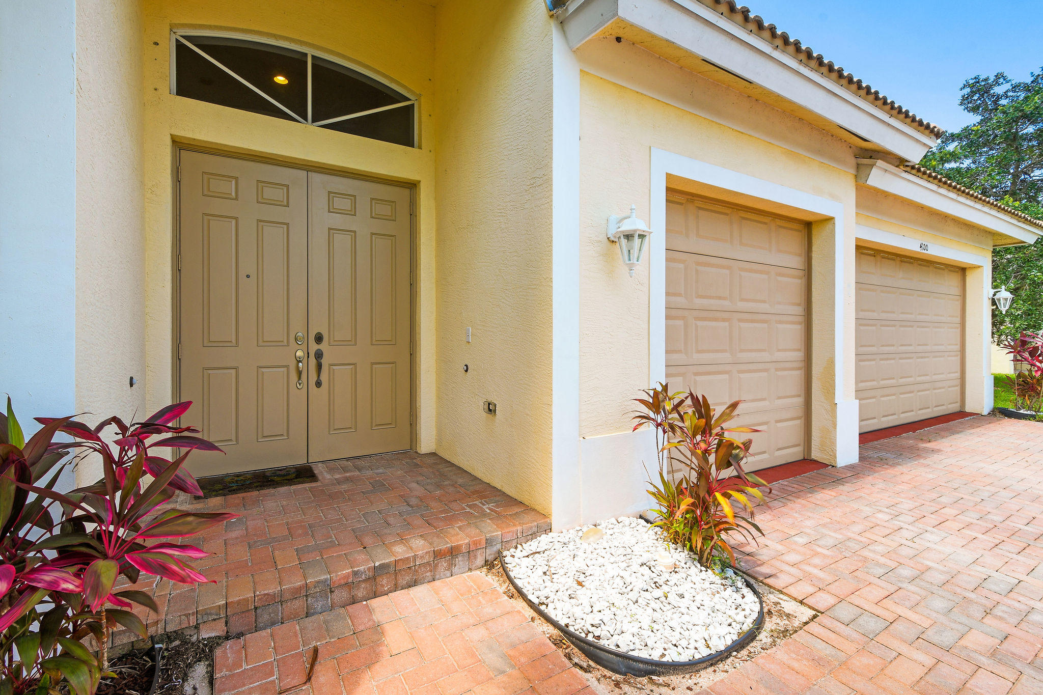 4100 Silverstone Drive Fort Pierce, FL 34947 - Photo 4 of 42 a front view of a house with shower