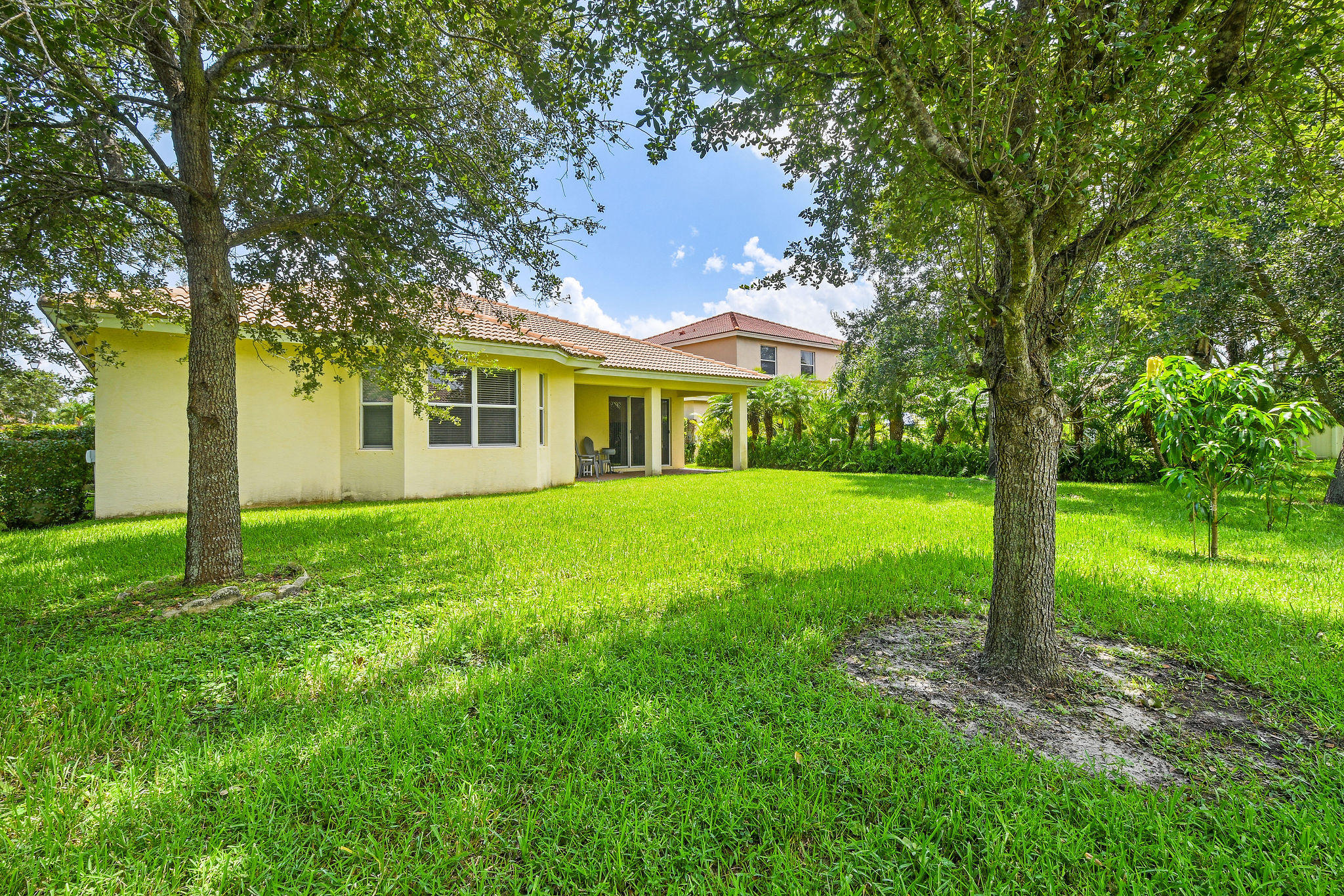 4100 Silverstone Drive Fort Pierce, FL 34947 - Photo 42 of 42 a view of a house with a yard