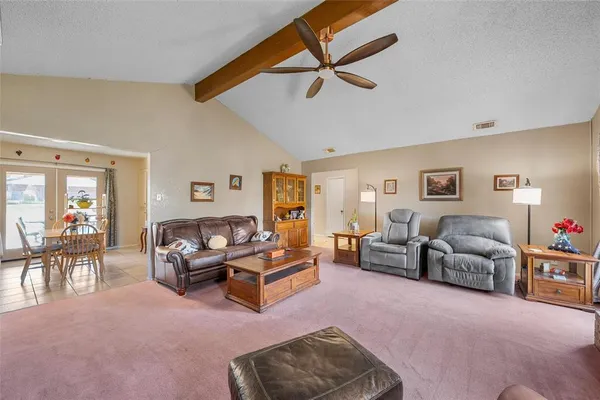 a living room with furniture and a couch