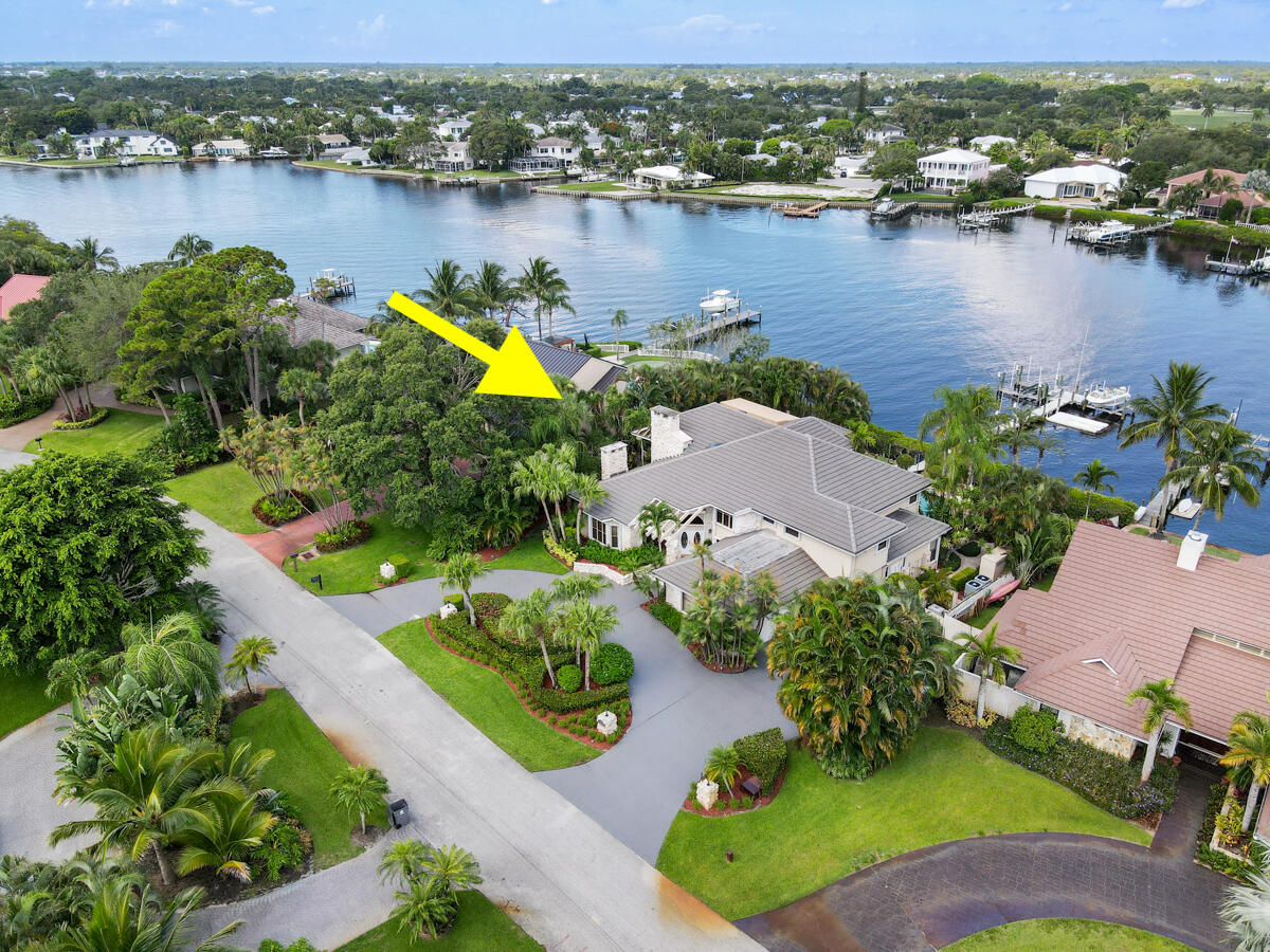 19842 Wilkinson Leas Road Jupiter, FL 33469 - Photo 18 of 75 an aerial view of a house with lake view