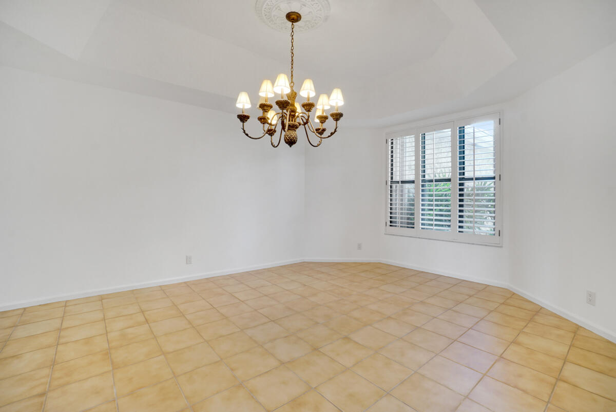 19842 Wilkinson Leas Road Jupiter, FL 33469 - Photo 23 of 75 a view of an empty room with a window