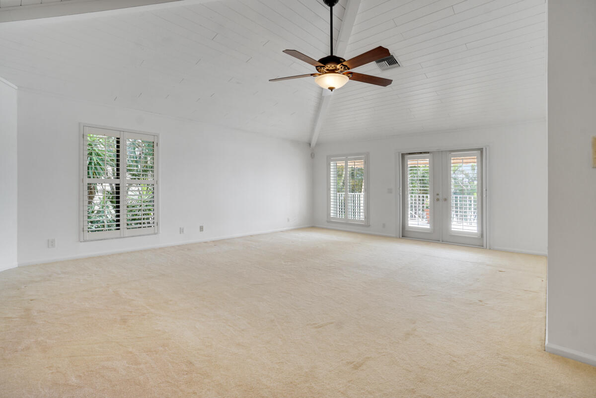 19842 Wilkinson Leas Road Jupiter, FL 33469 - Photo 33 of 75 a view of an empty room with a window