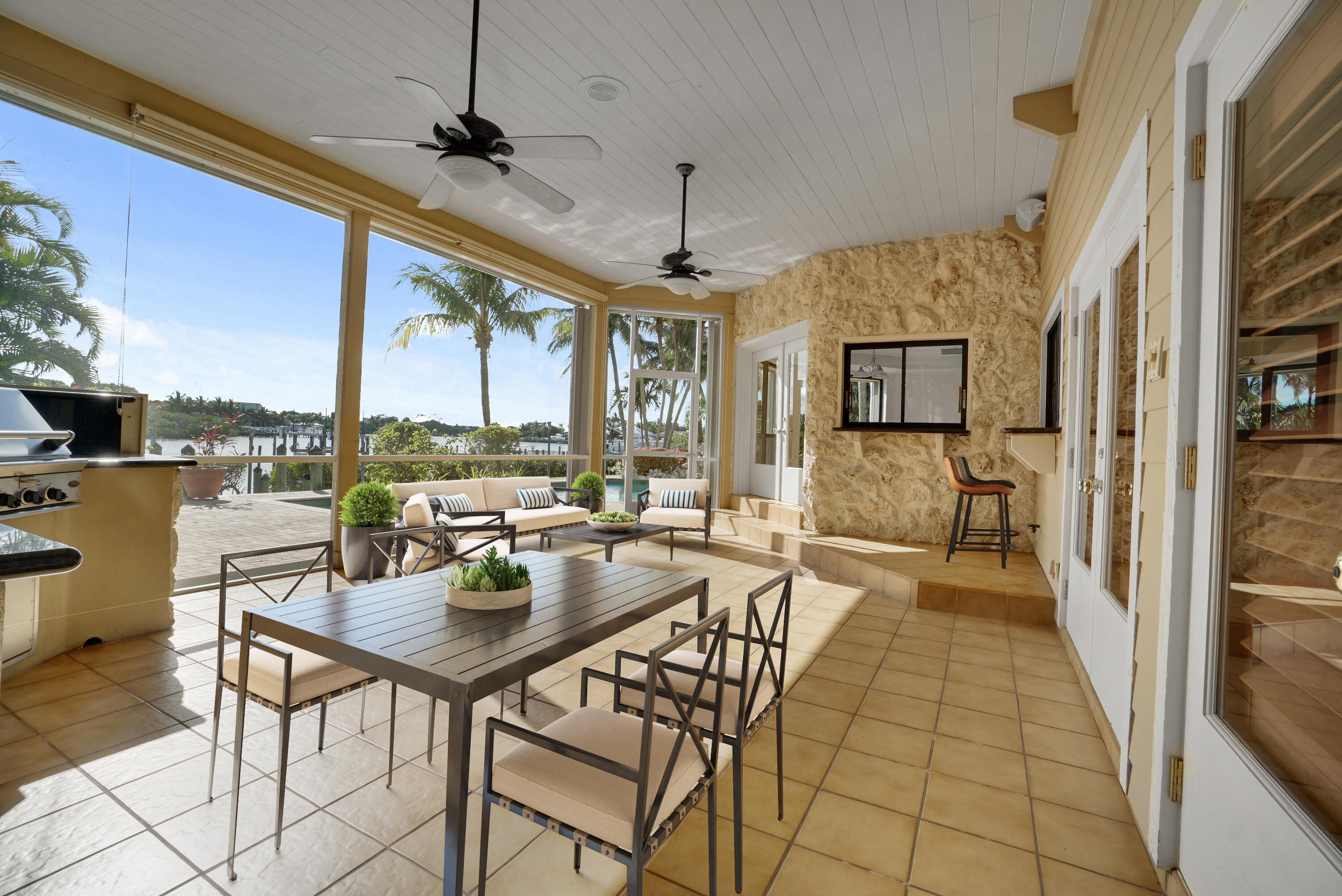 19842 Wilkinson Leas Road Jupiter, FL 33469 - Photo 4 of 75 a view of a dining room with furniture window and outside view