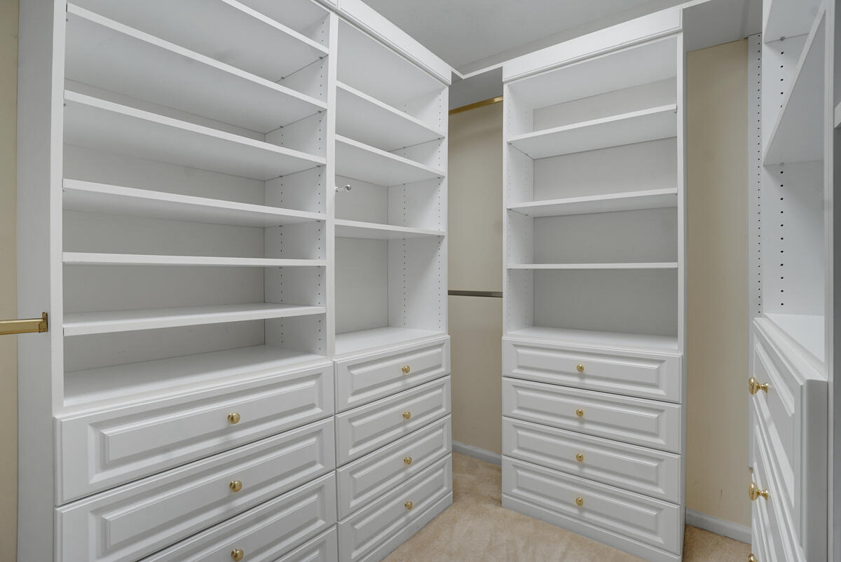19842 Wilkinson Leas Road Jupiter, FL 33469 - Photo 41 of 75 a view of walk in closet with empty racks