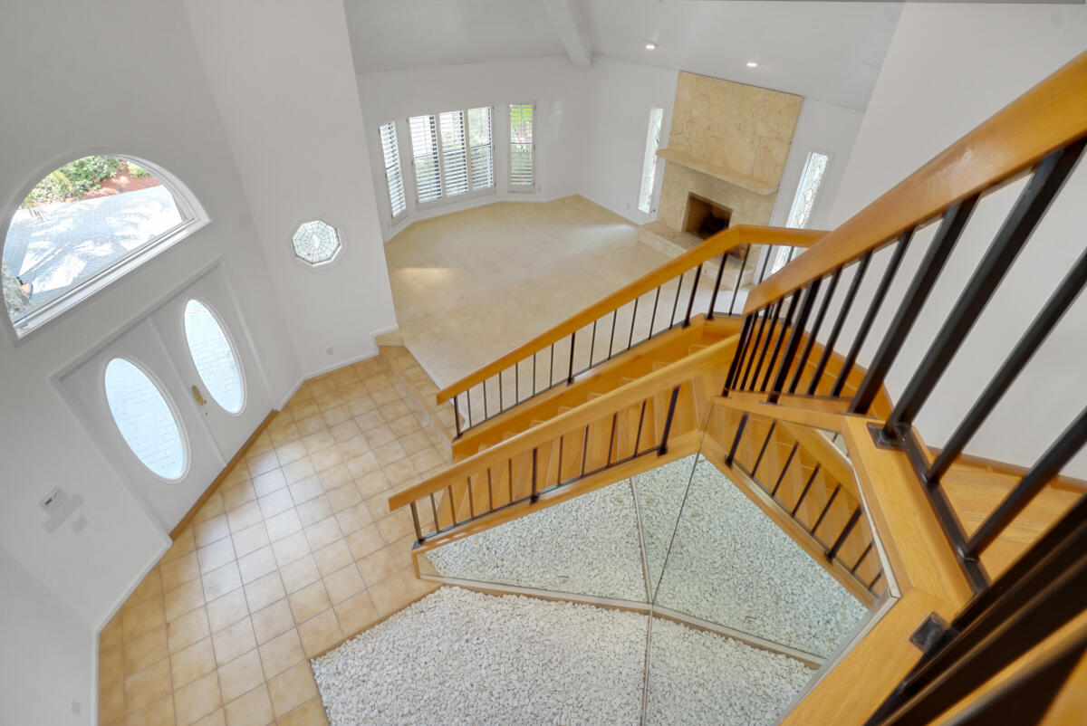 19842 Wilkinson Leas Road Jupiter, FL 33469 - Photo 49 of 75 a view of staircase with furniture