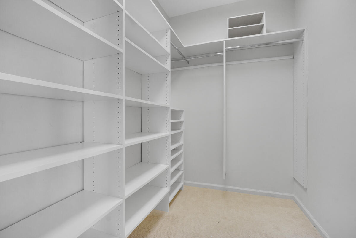 19842 Wilkinson Leas Road Jupiter, FL 33469 - Photo 53 of 75 a view of an empty walk in closet