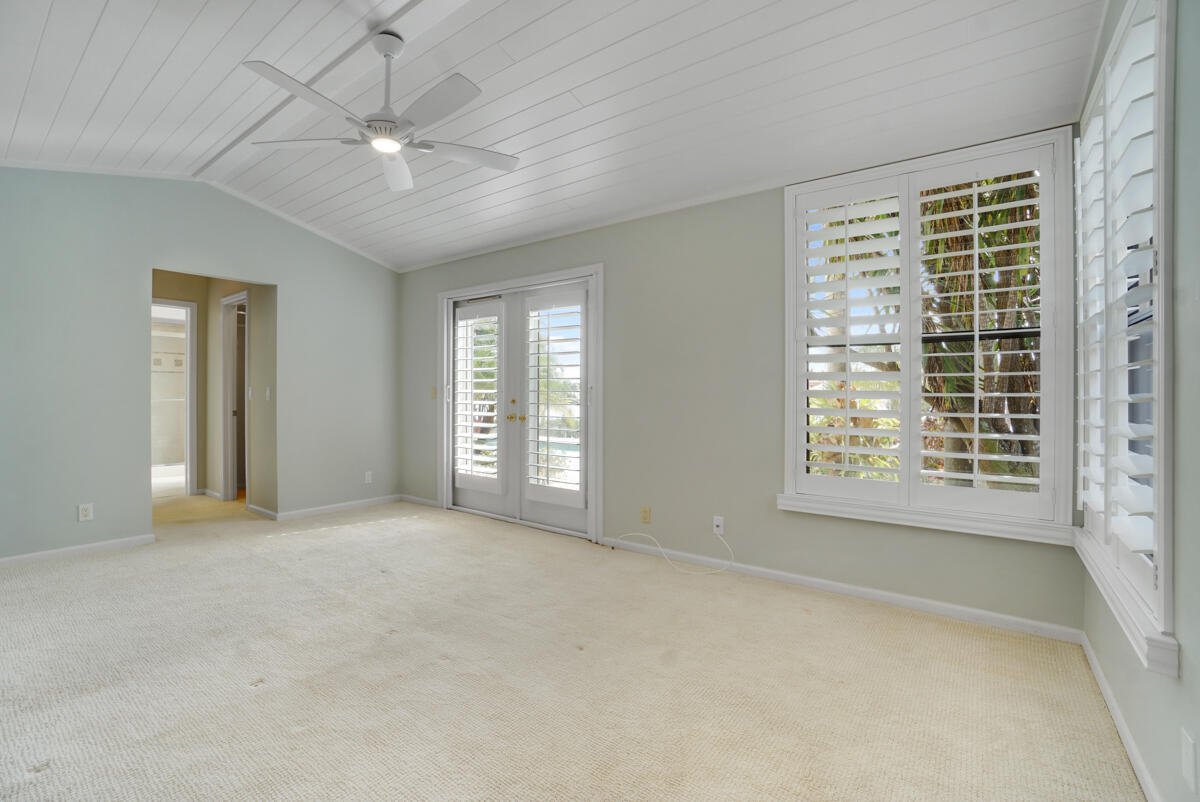19842 Wilkinson Leas Road Jupiter, FL 33469 - Photo 55 of 75 a view of an empty room with a window