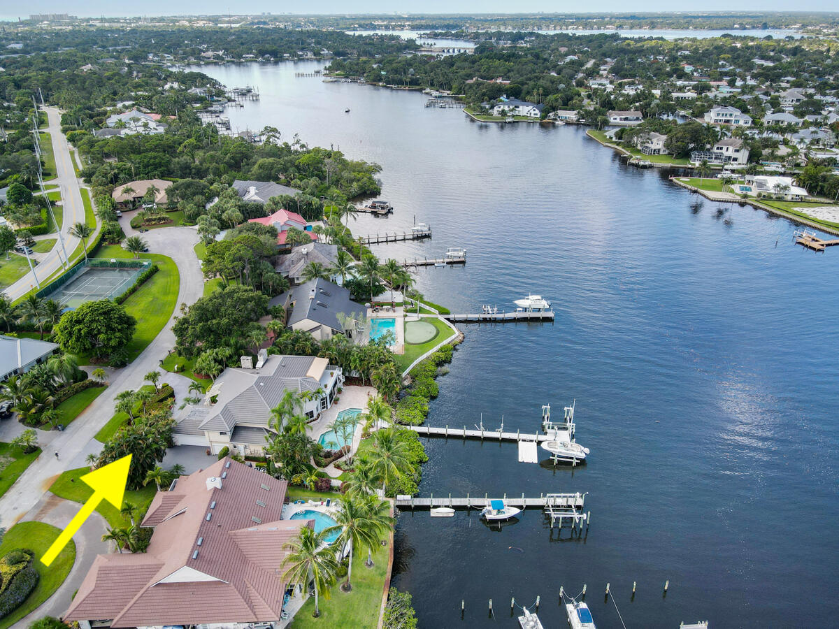 19842 Wilkinson Leas Road Jupiter, FL 33469 - Photo 67 of 75 an aerial view of a city with lake view