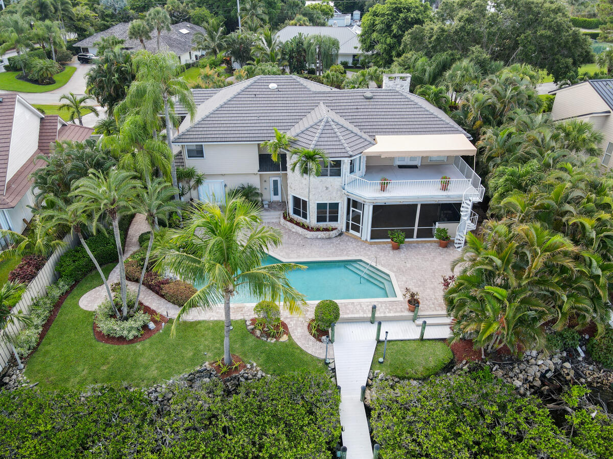 19842 Wilkinson Leas Road Jupiter, FL 33469 - Photo 70 of 75 an aerial view of a house with yard swimming pool and outdoor seating