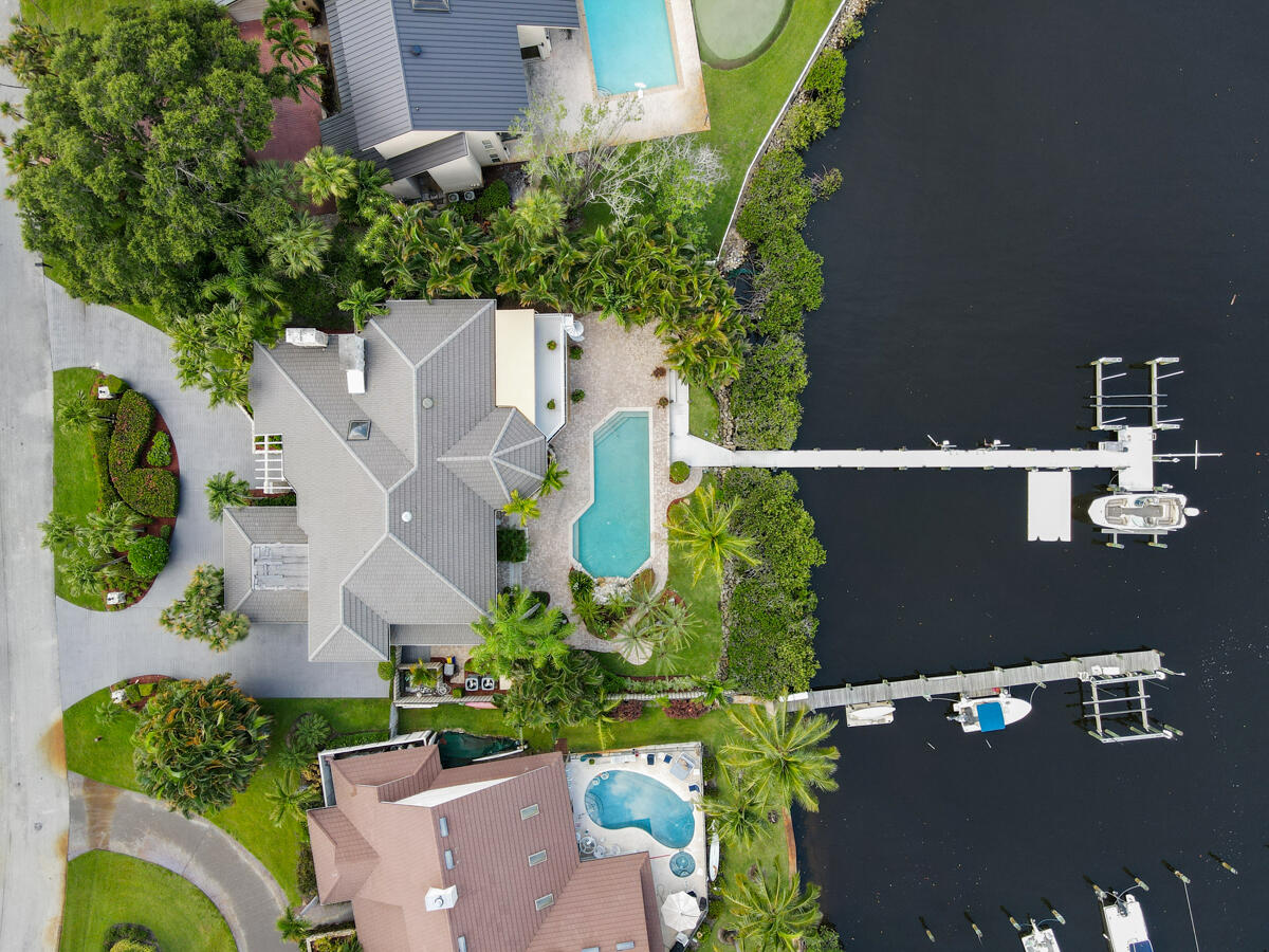 19842 Wilkinson Leas Road Jupiter, FL 33469 - Photo 74 of 75 an aerial view of a house with a yard