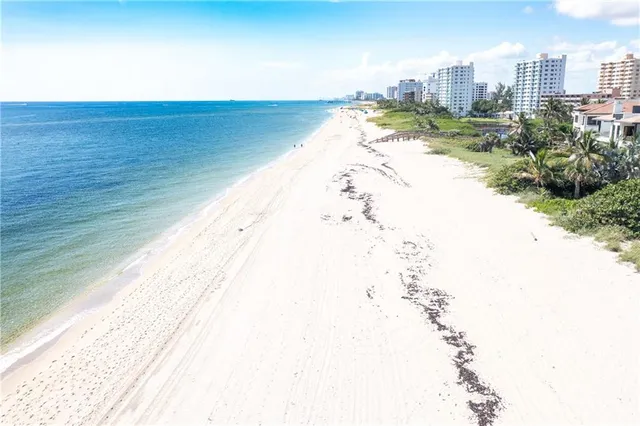 a view of a street with a building in the background