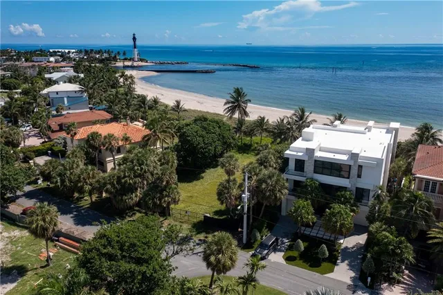 an aerial view of a house with a garden