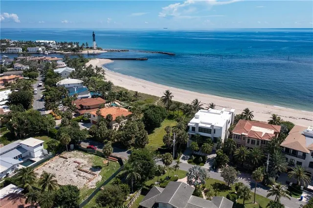 an aerial view of house with yard