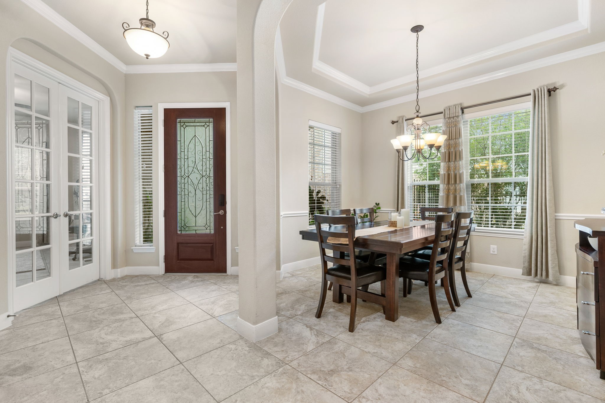 11 Pintuck Place Spring, TX 77389 - Photo 5 of 40 a view of a dining room with furniture window and outside view