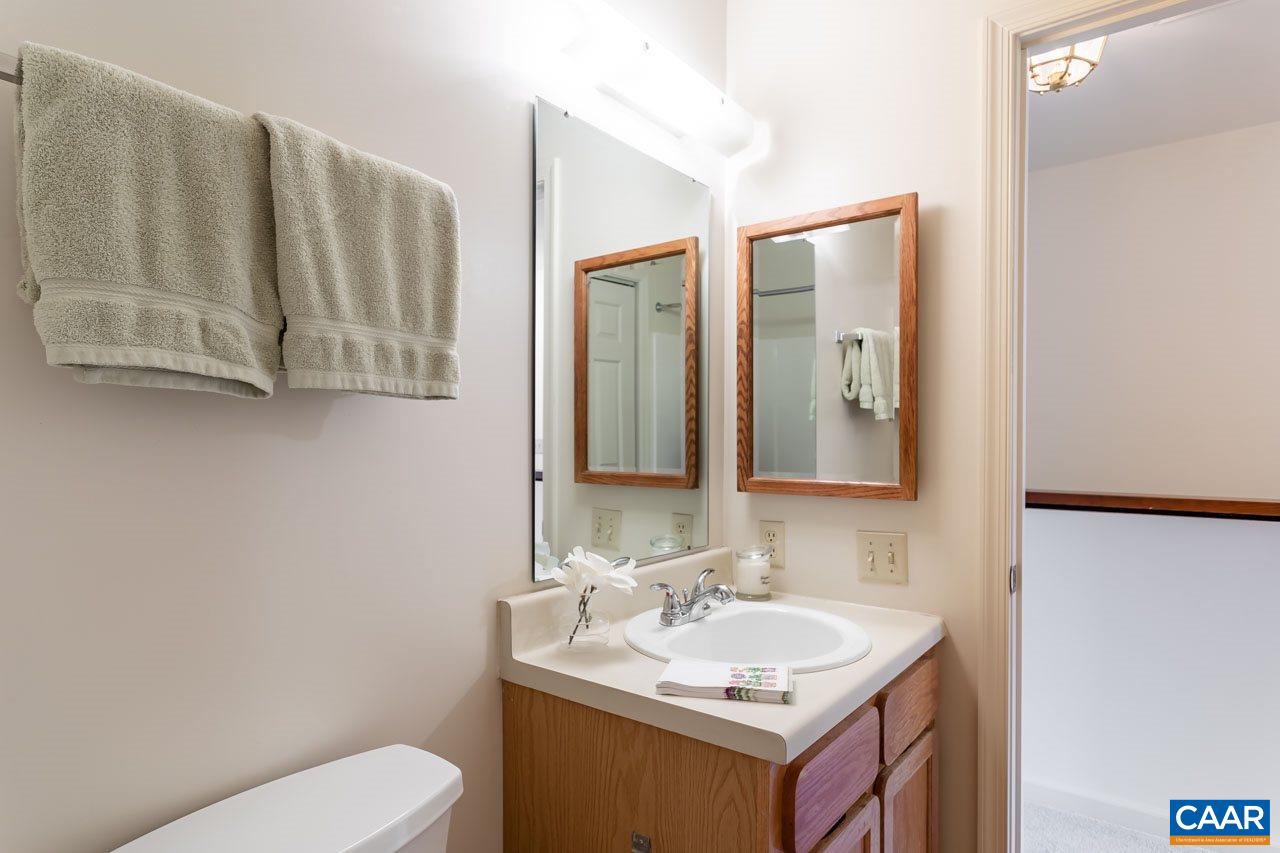 1509 Minor Ridge Court Charlottesville, VA 22901 - Photo 16 of 20 a bathroom with a sink toilet and mirror
